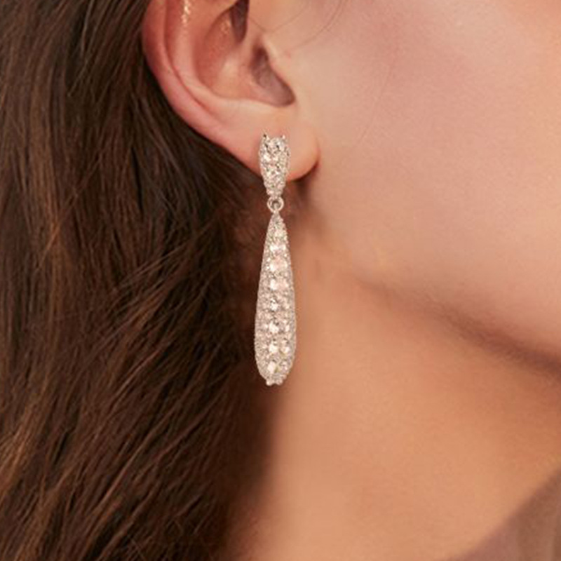 Pendientes elegantes exquisitos en gotas de cobre con zirconio cúbico para mujer